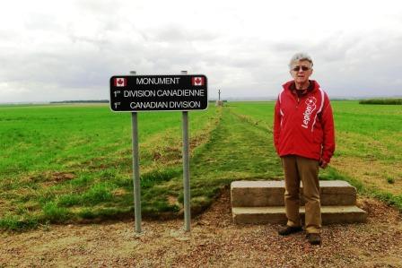 CIMG8314 Sep 5 2017 Pieter by sign directing you to Memorial to 1st Cdn Division