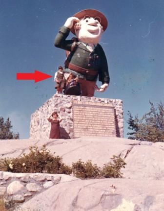 Ca 1967 Daria Mom Gary by statue in Flin Flon