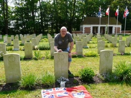 P1450929 May 11 2024 Patrick Michaels at grave of Harold Bulger in Adegem