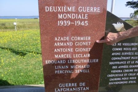 CIMG7001 Aug 27 2024 Armand Gionet on list of names at Bas Caraquet Monument